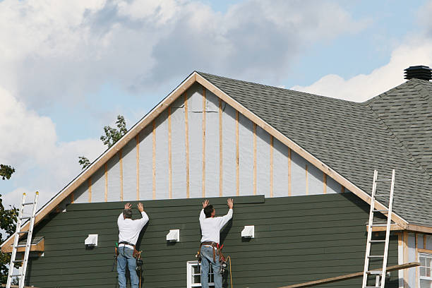Professional Emergency Siding Repair technician working in Richfield, PA